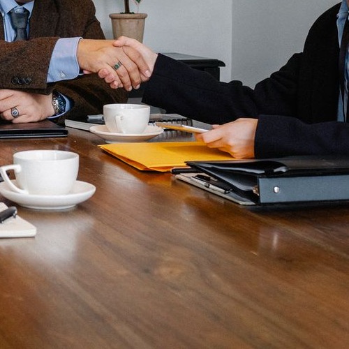 Business partners confirming a long-term cooperation agreement